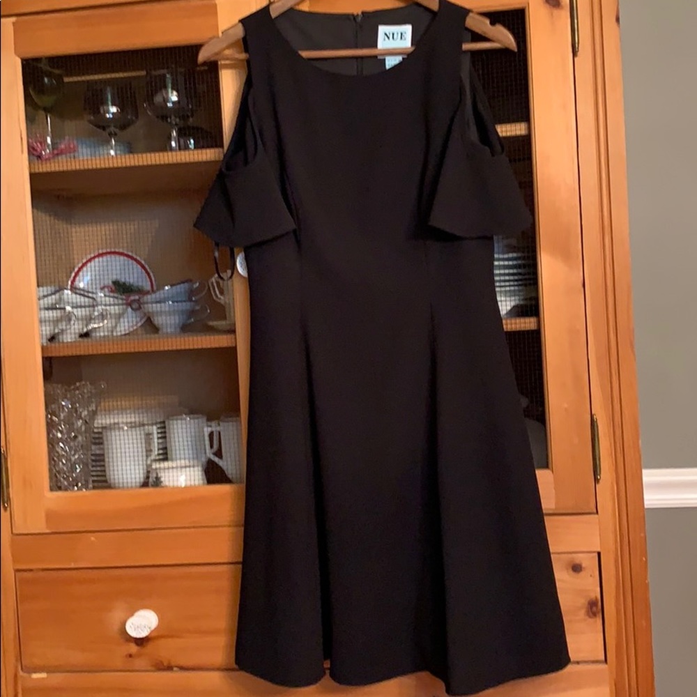 Adorable little black dress cold shoulder.